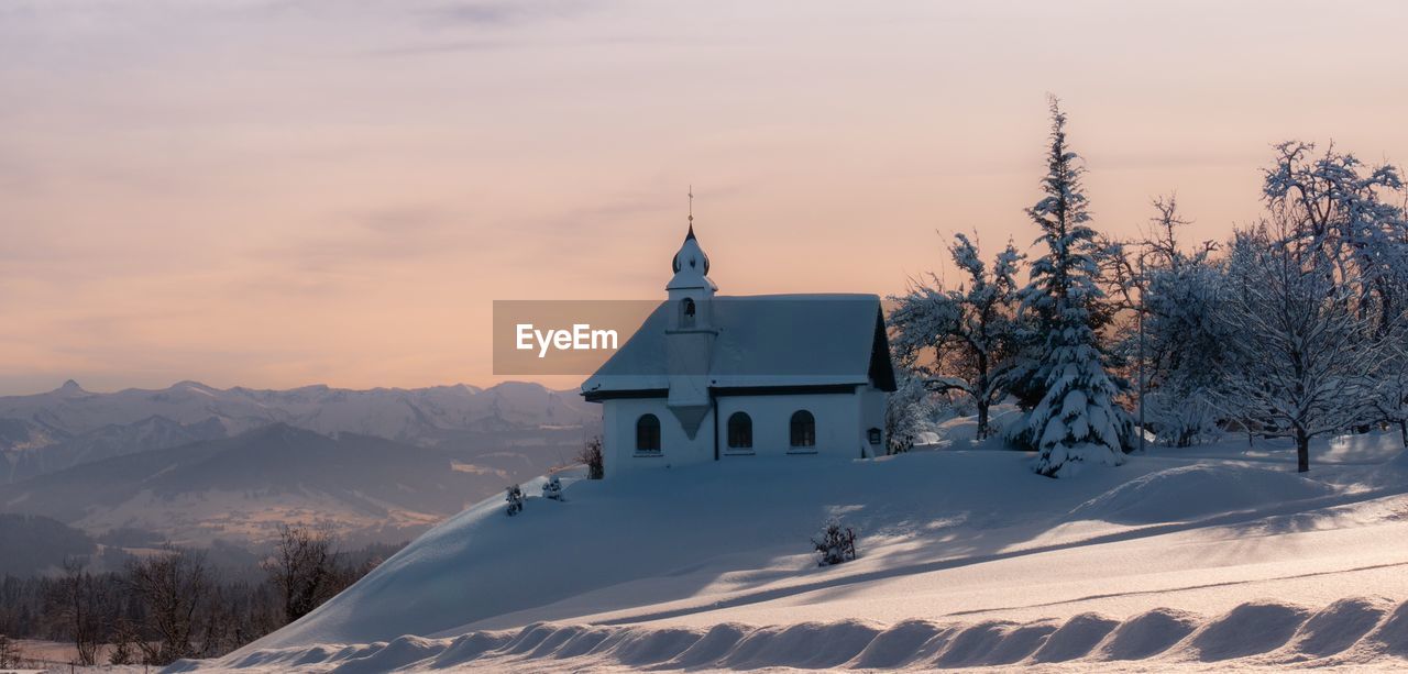 BUILDING AGAINST SKY DURING WINTER