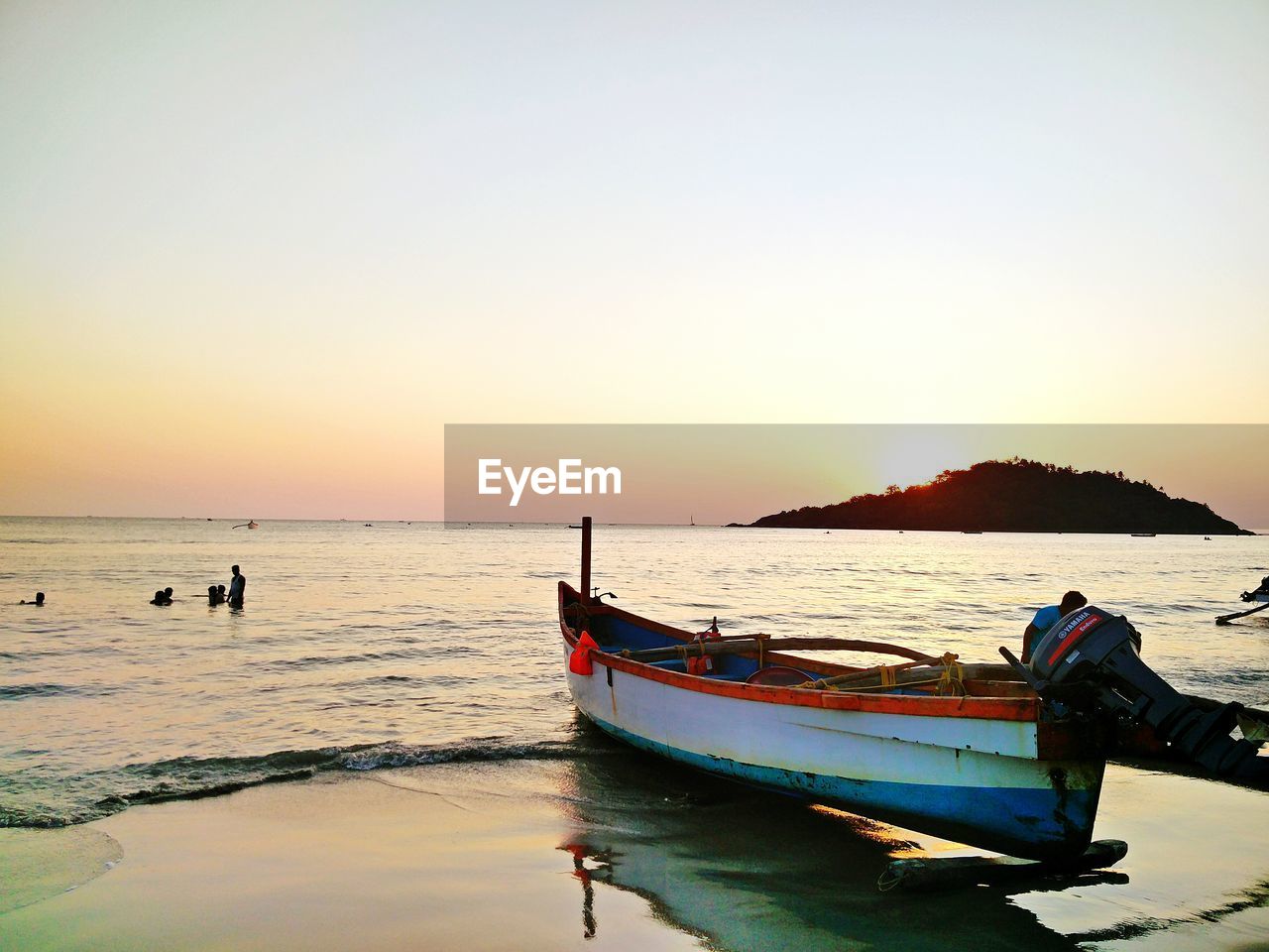 Scenic view of sea at sunset
