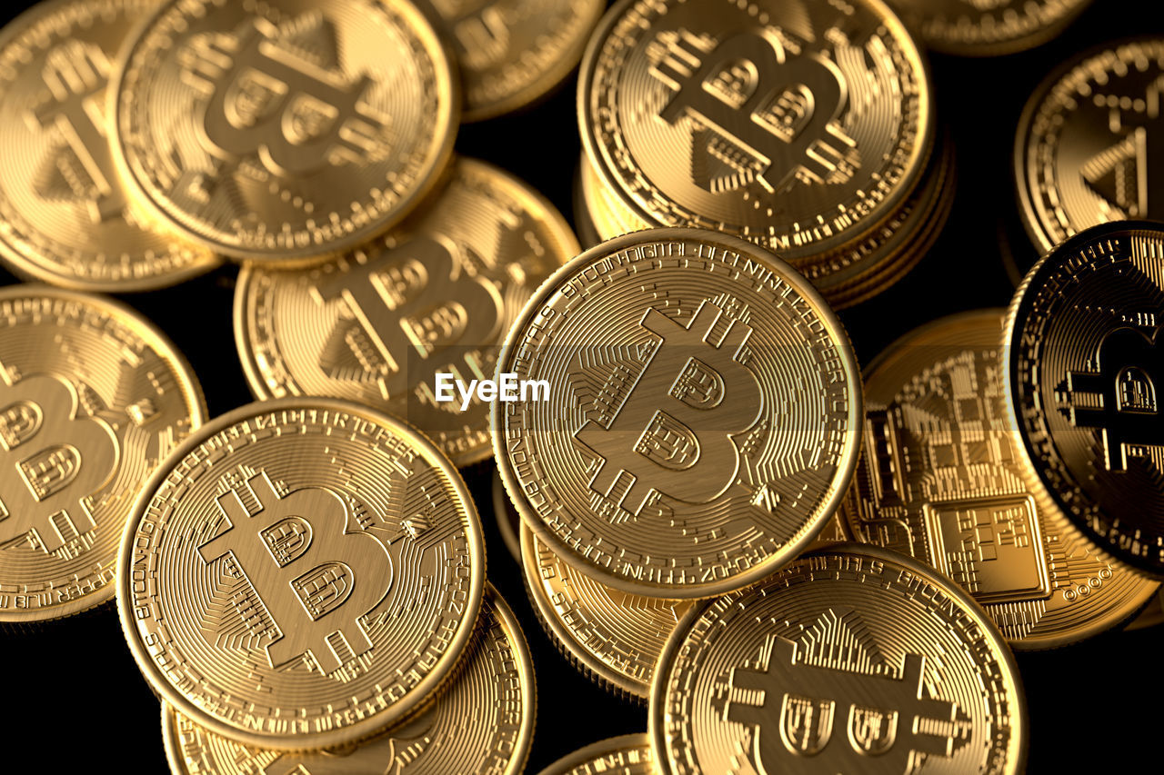 HIGH ANGLE VIEW OF COINS ON SHELF