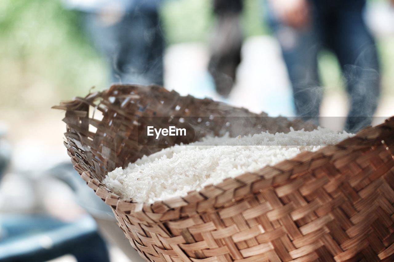 Close-up of cooked rice in wicker basket