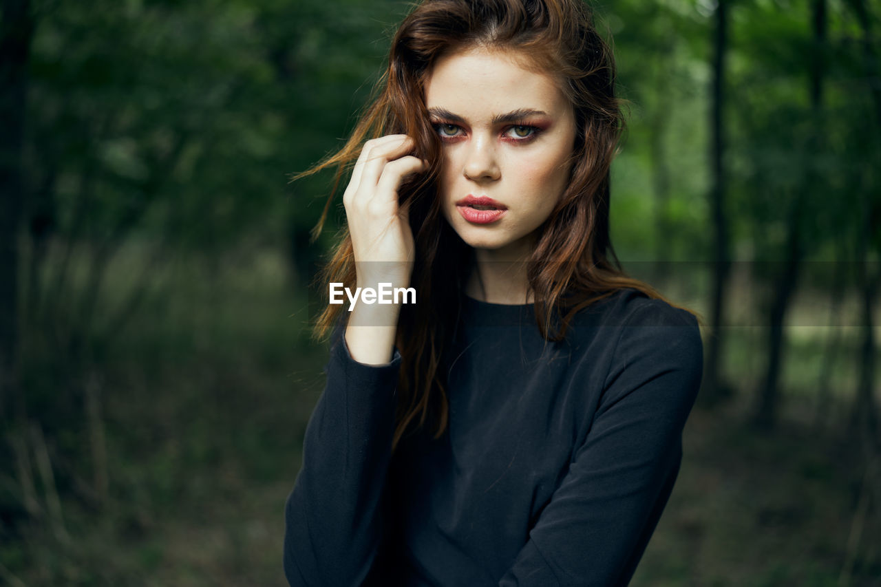 portrait of young woman looking away