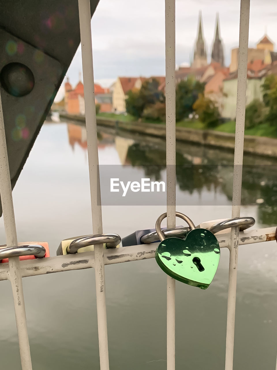 CLOSE-UP OF PADLOCK ON RAILING