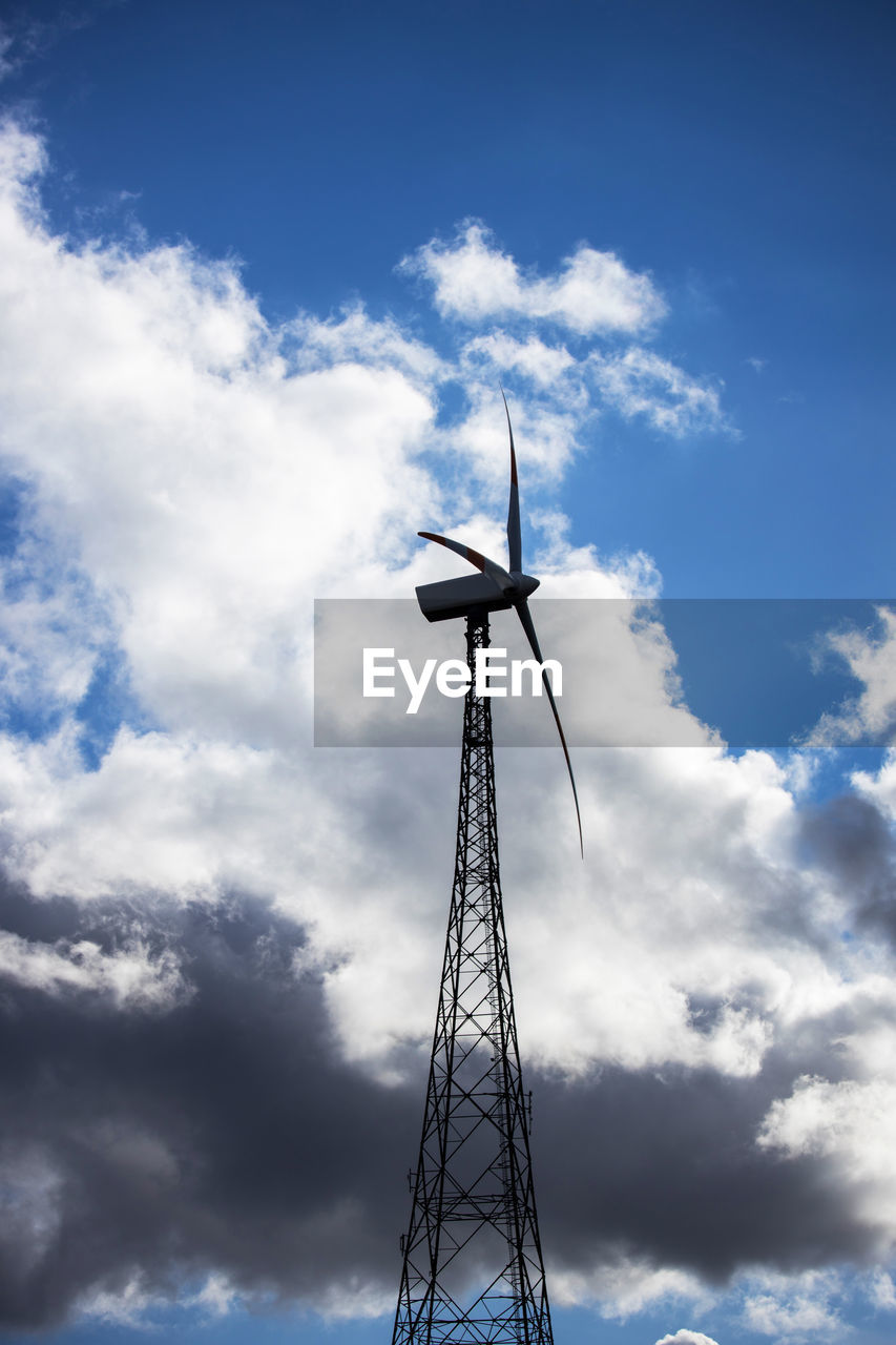 sky, cloud, power generation, environmental conservation, renewable energy, environment, alternative energy, wind power, turbine, wind turbine, nature, technology, blue, low angle view, machine, no people, electricity, industry, outdoors, windmill, architecture, day, wind, built structure, landscape, power supply, tower, cloudscape, rural scene, mast, beauty in nature