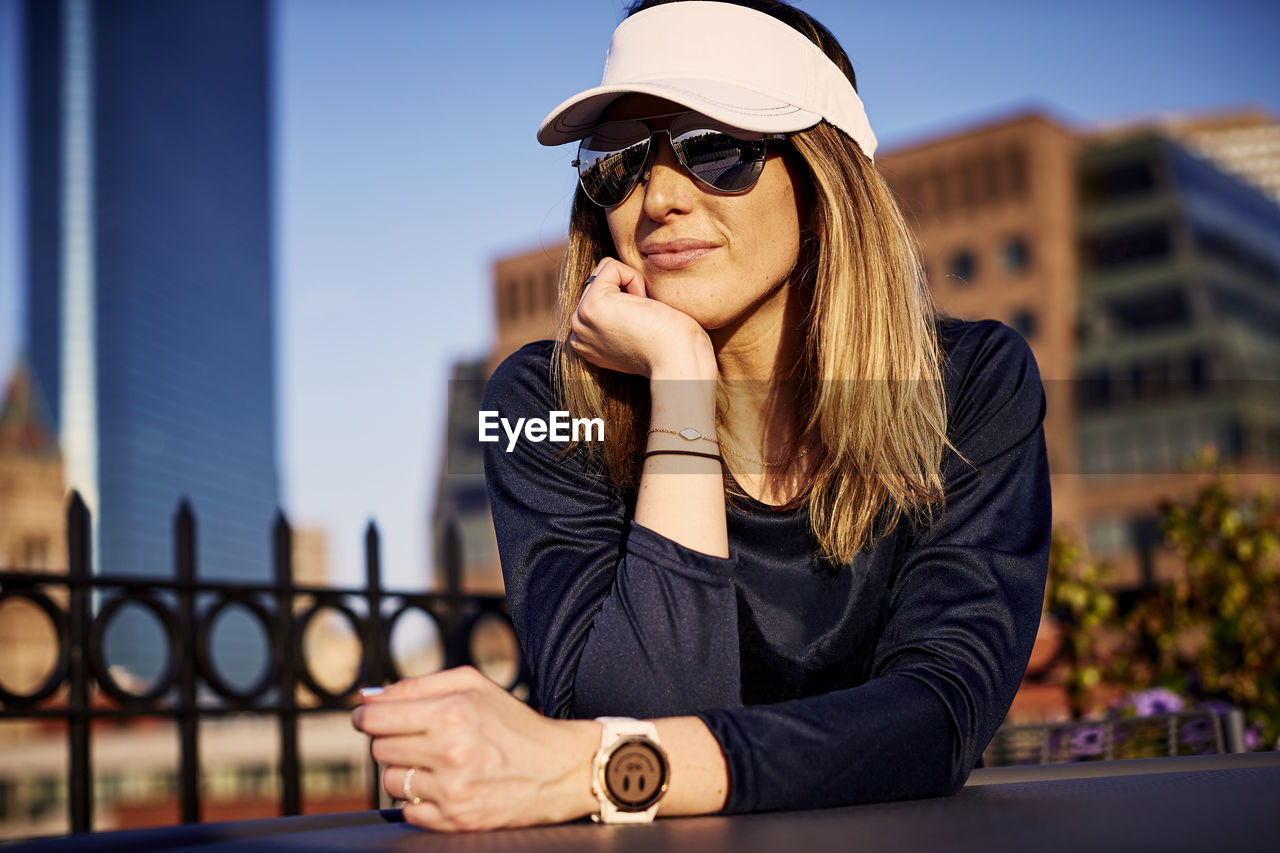 An outdoor portrait of a woman in the city.