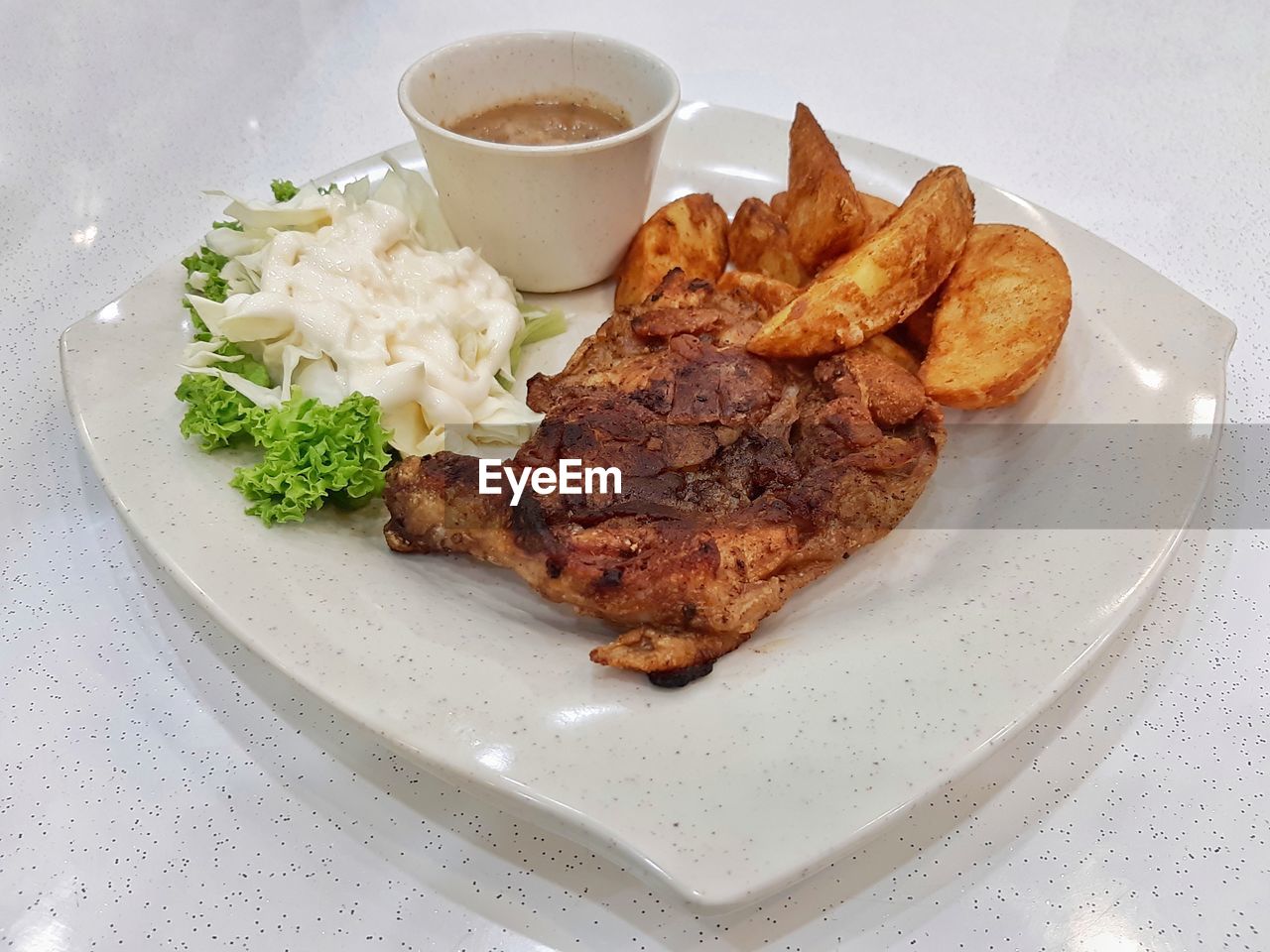 HIGH ANGLE VIEW OF FOOD SERVED ON TABLE