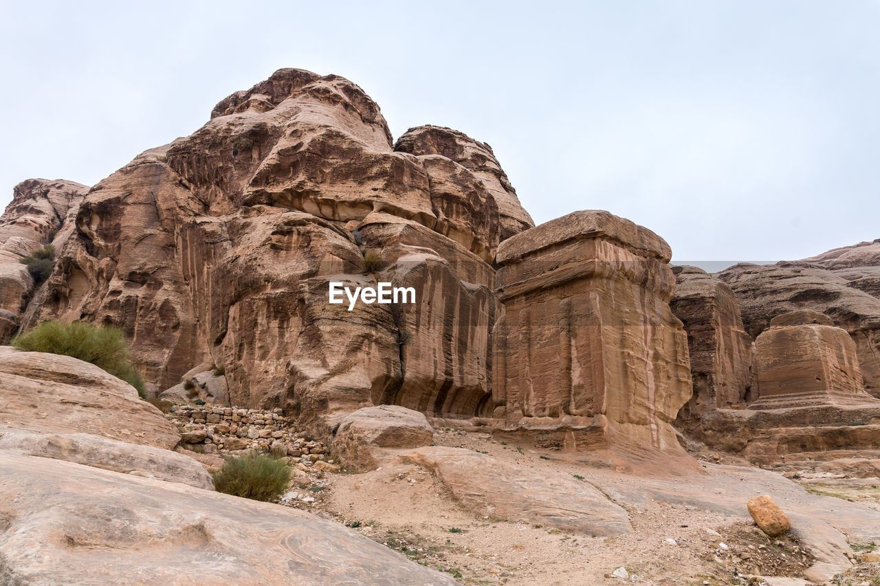 LOW ANGLE VIEW OF ROCK FORMATIONS