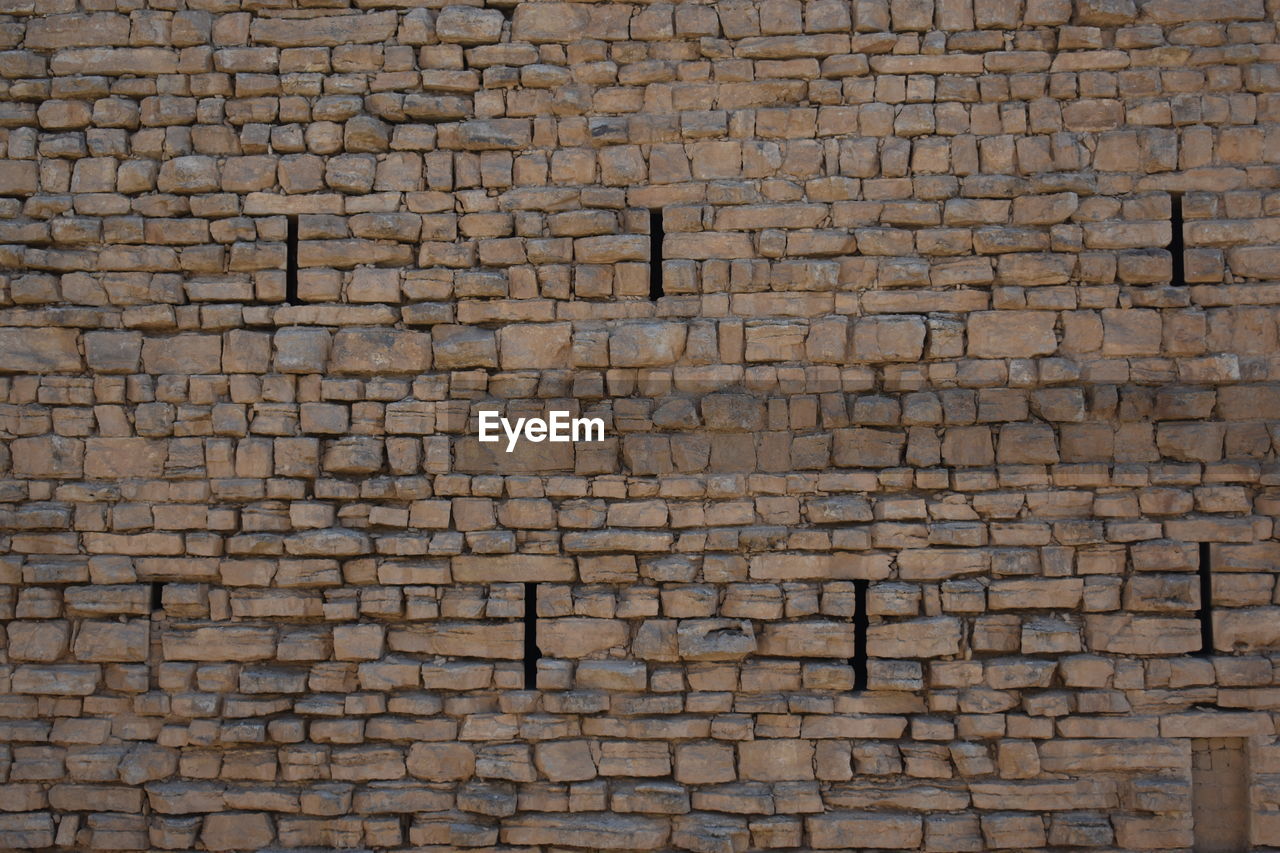 Full frame shot of medieval brick wall
