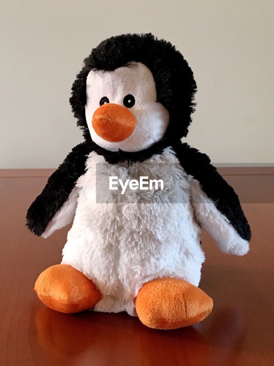 Close-up of penguin toy on table