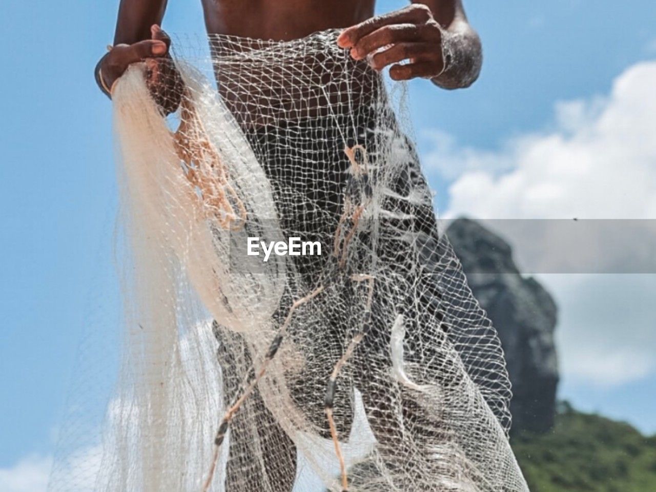wedding dress, spring, sky, nature, one person, adult, bride, fishing net, cloud, day, fishing industry, dress, fishing, water, clothing, low angle view, activity, outdoors, commercial fishing net, veil, women, holding, motion, netting, blue, person, hand
