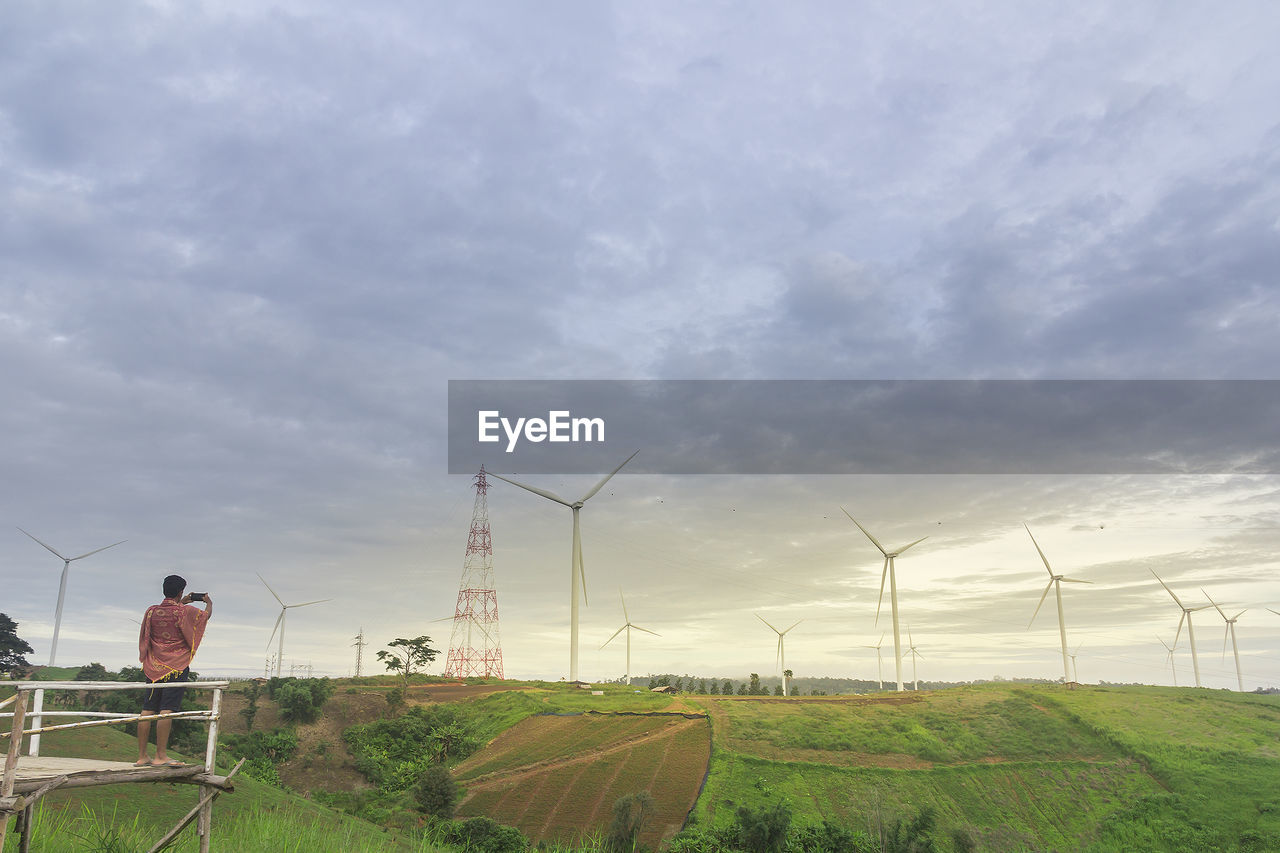 WIND TURBINES ON FIELD