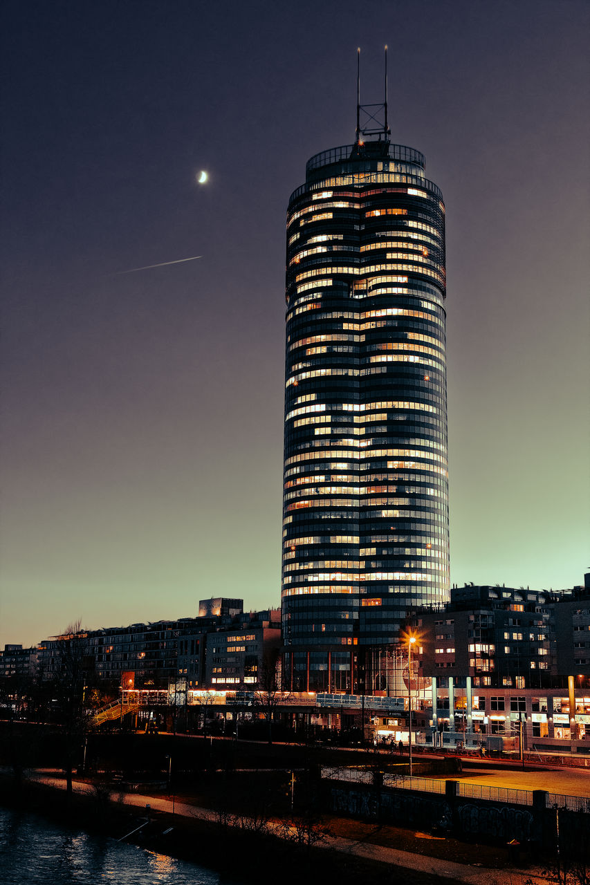 Illuminated buildings in city at night