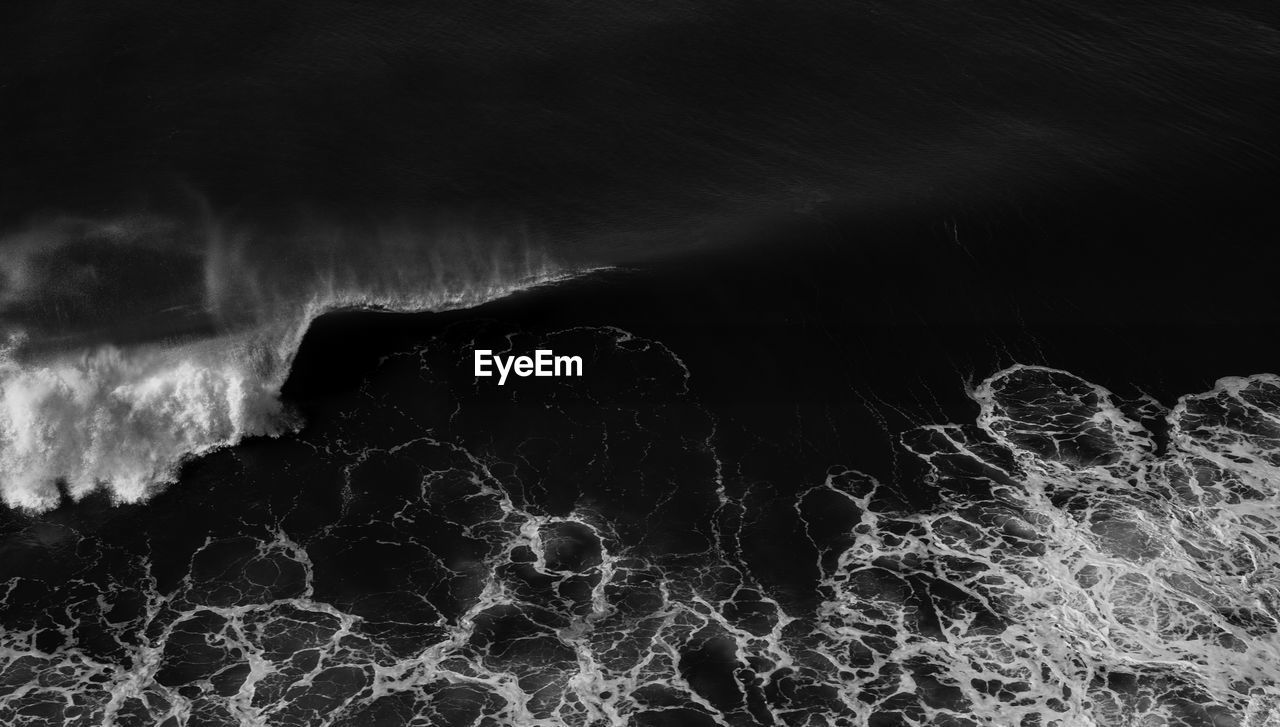 High angle view of waves at sea