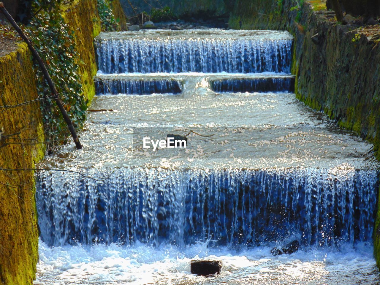 Scenic view of river flowing through landscape