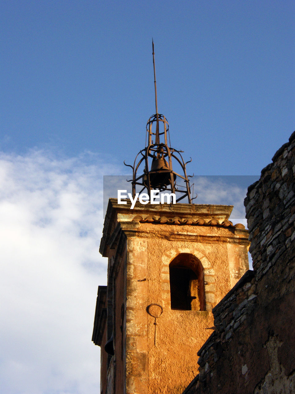 LOW ANGLE VIEW OF BELL TOWER WITH SKY