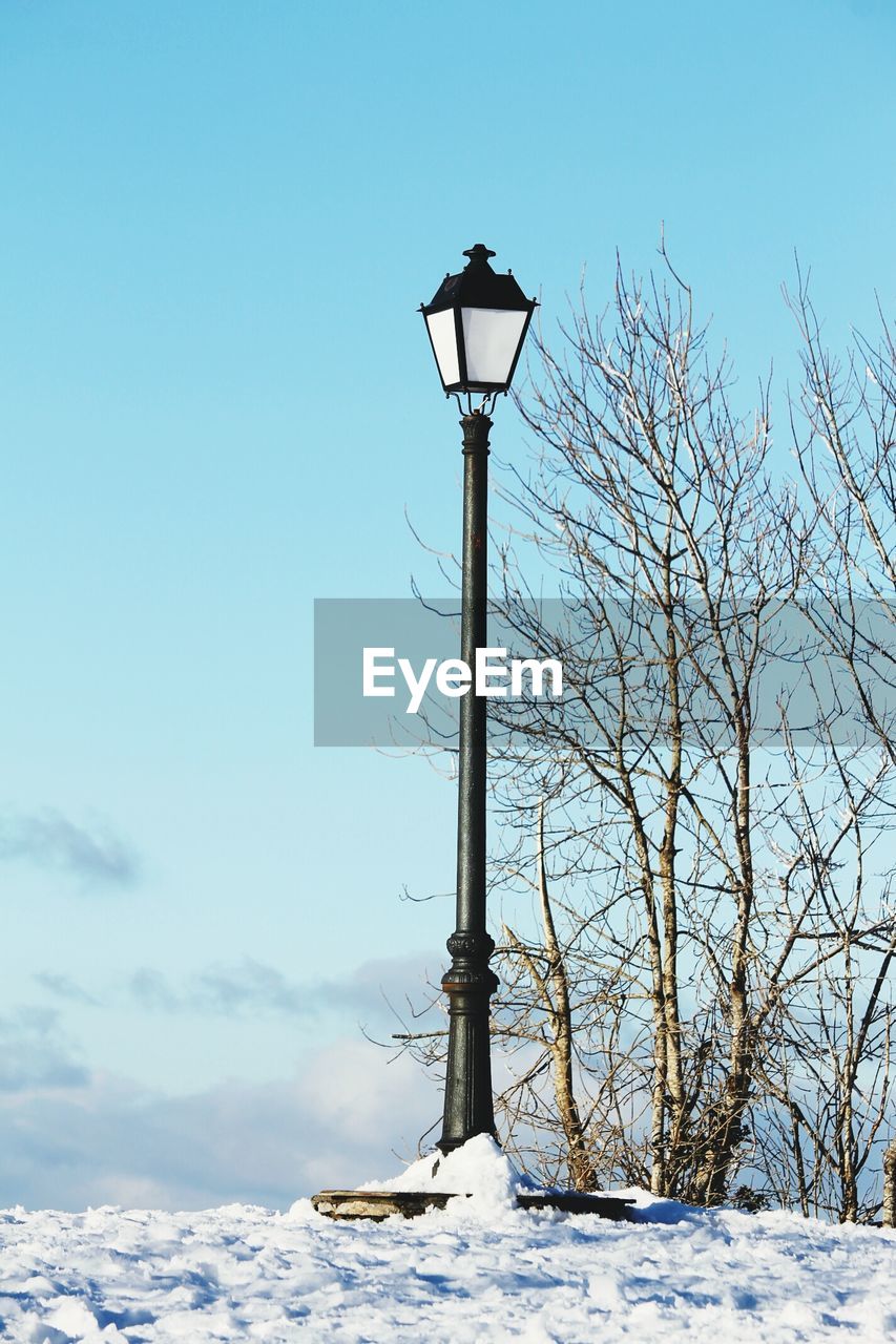 Single lantern in winter scenery