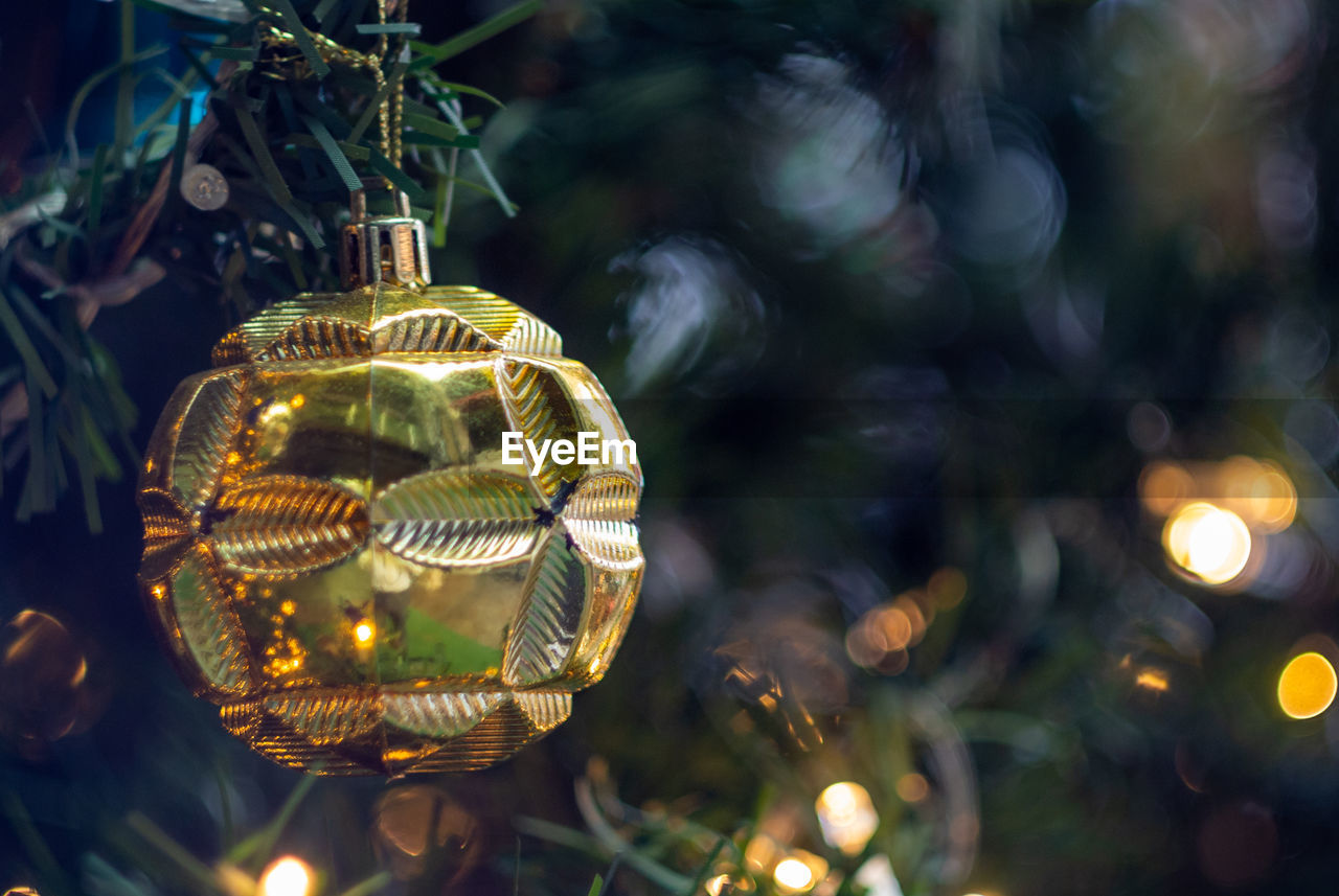 CLOSE-UP OF ILLUMINATED CHRISTMAS DECORATION