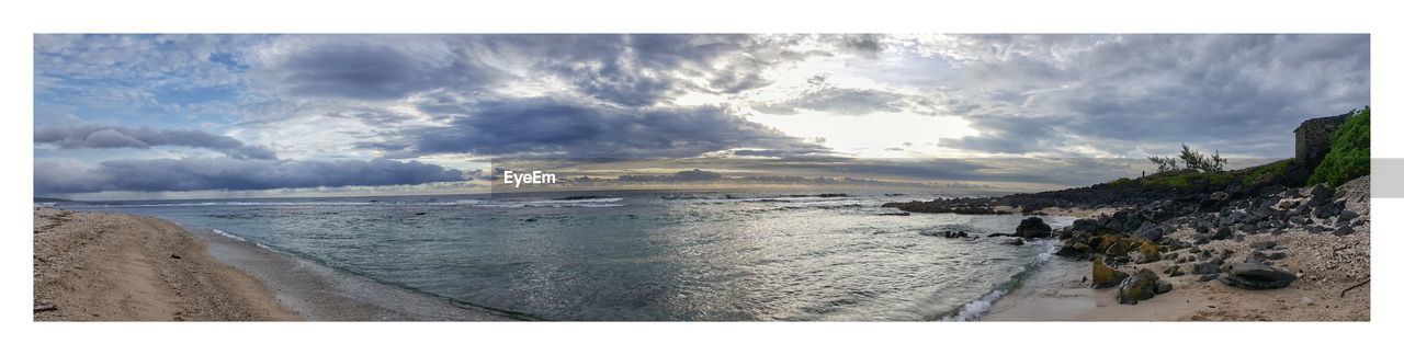 PANORAMIC SHOT OF BEACH AGAINST SKY