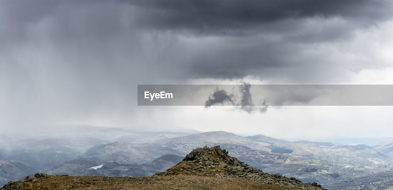 Beautiful cadair idris mountain landscape under cloudy sky