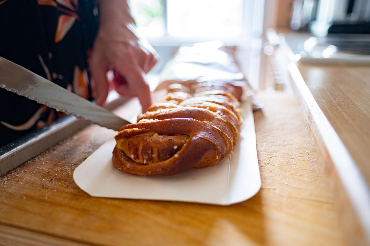 Cutting out pastry scandinavian pulla or bulla cinnamon 