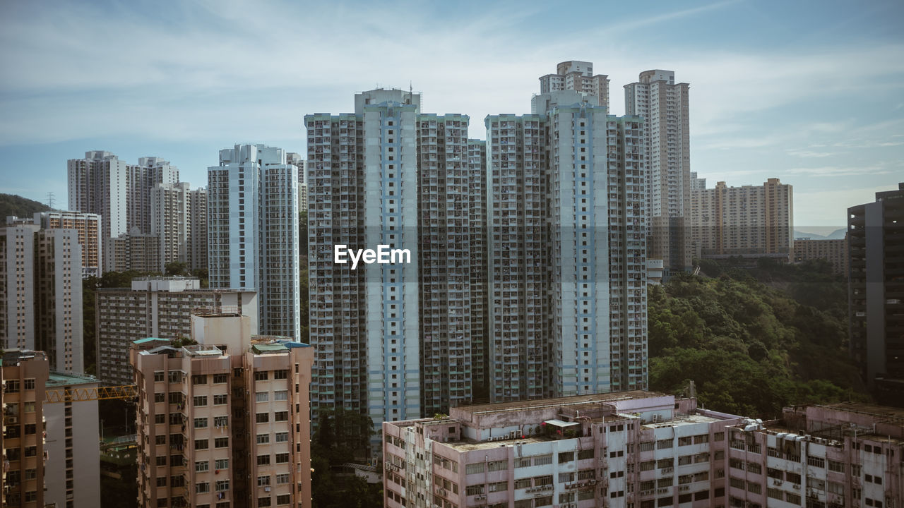 Skyscrapers in city against sky