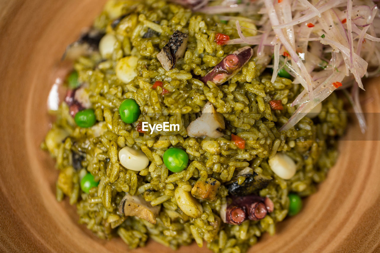 High angle view of rice and vegetables in bowl on table