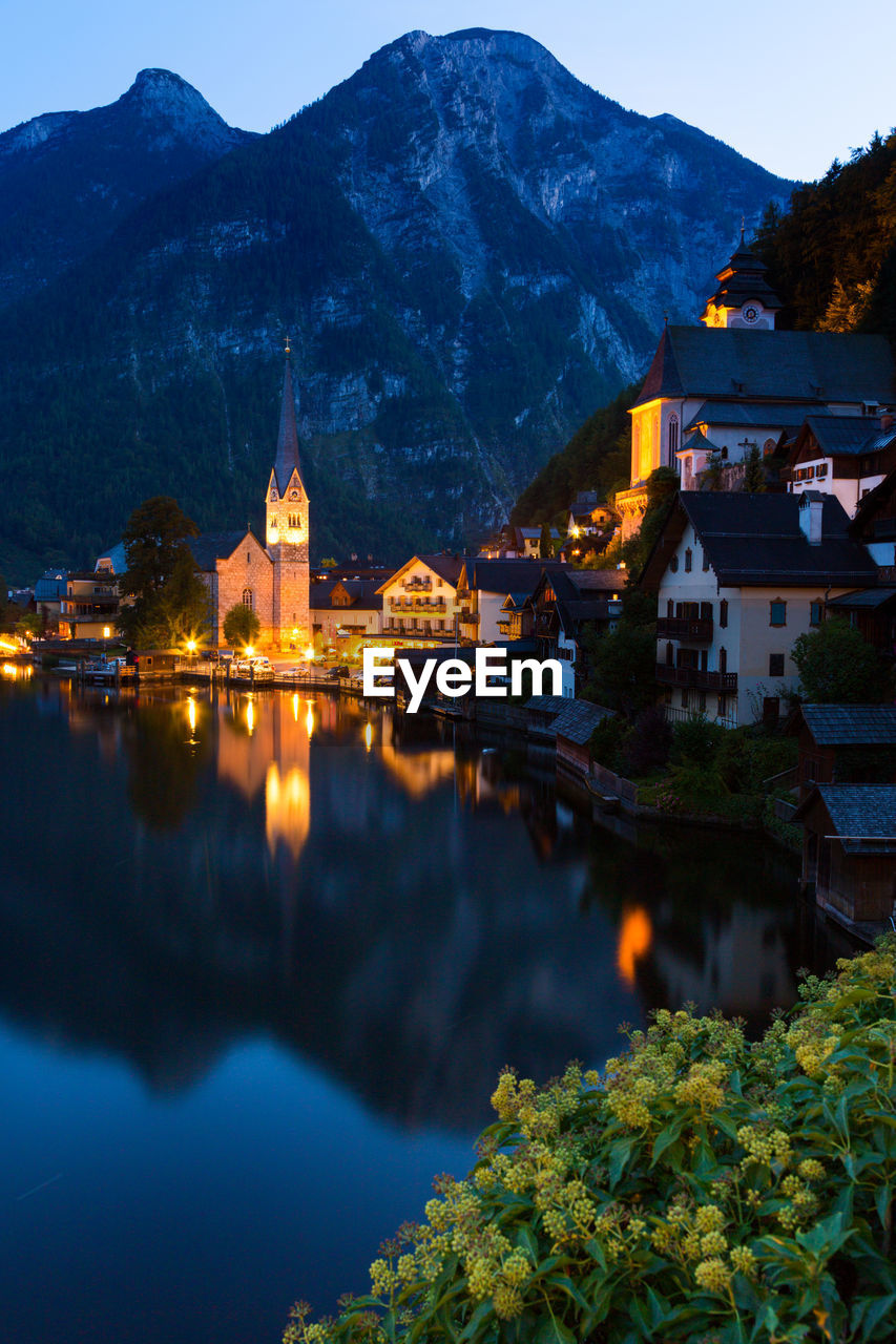 Scenic view of buildings along river