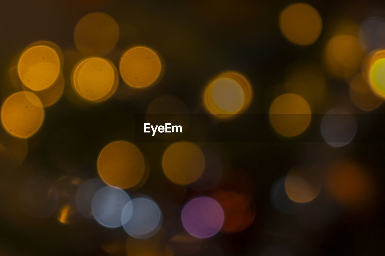 Defocused image of illuminated christmas tree