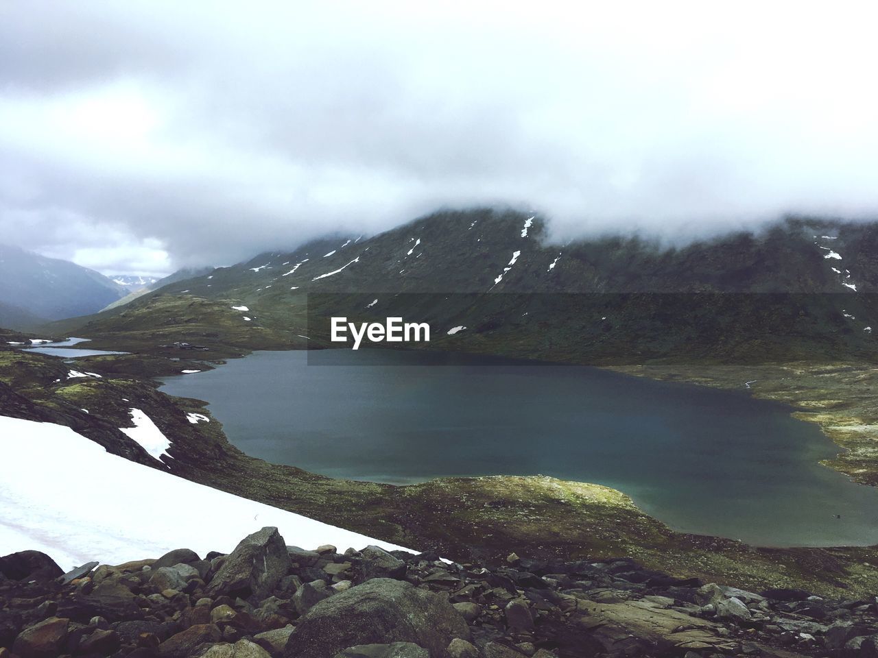 SCENIC VIEW OF MOUNTAINS AND SKY