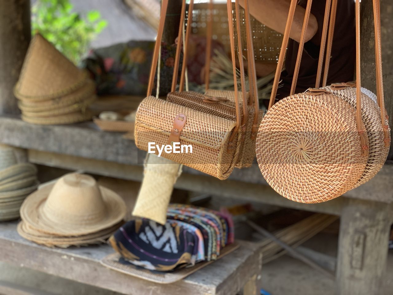 Close-up ethnic bag and hat for sale