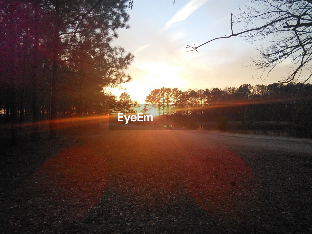 Empty road at sunset