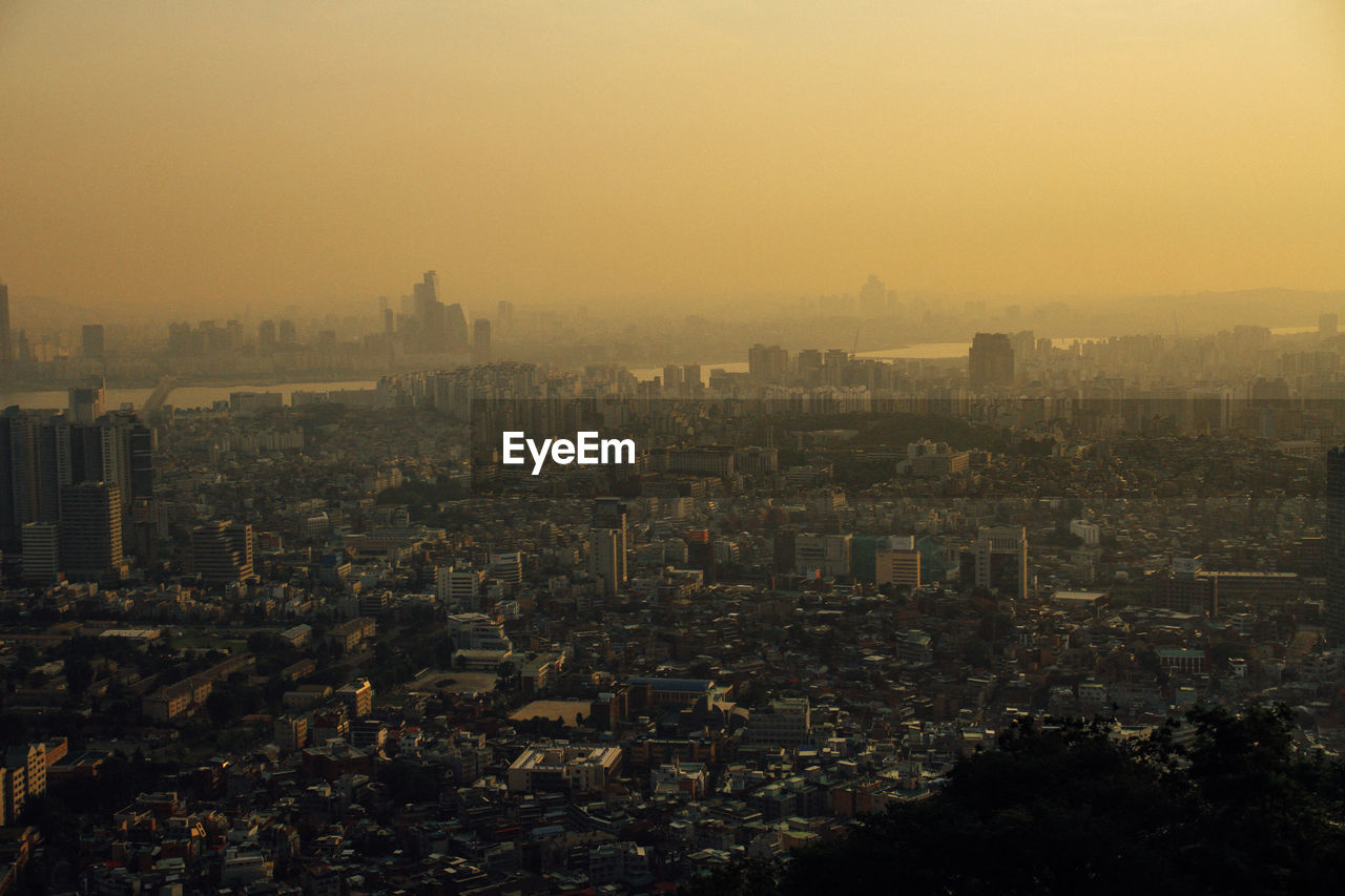 High angle shot of cityscape against clear sky