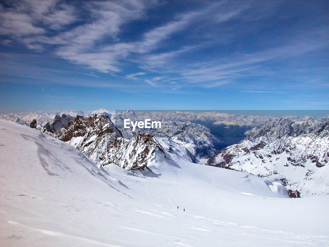 Mountains and white snowy landscape in the alps in winter