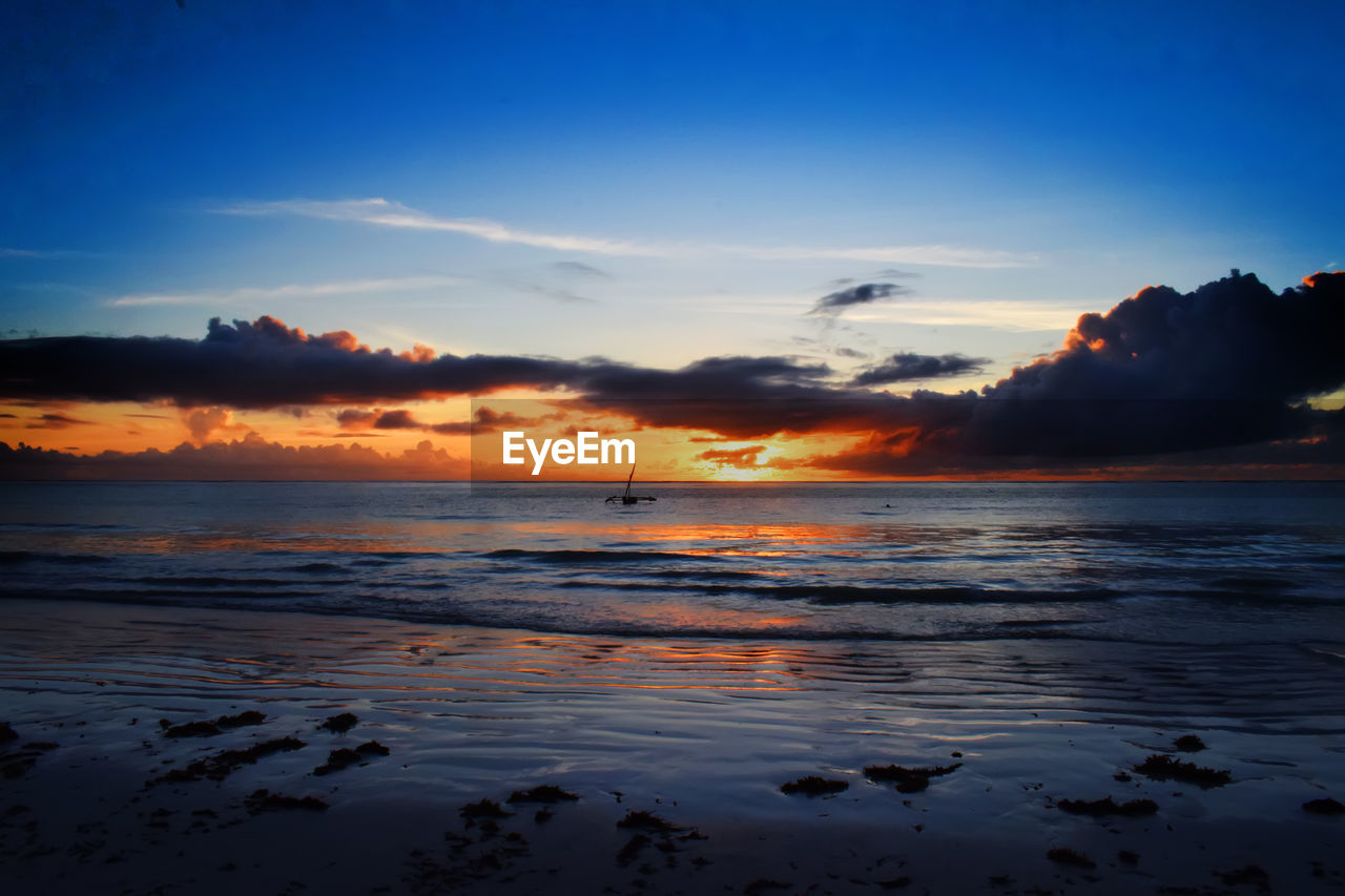 Scenic view of sea against sky during sunset