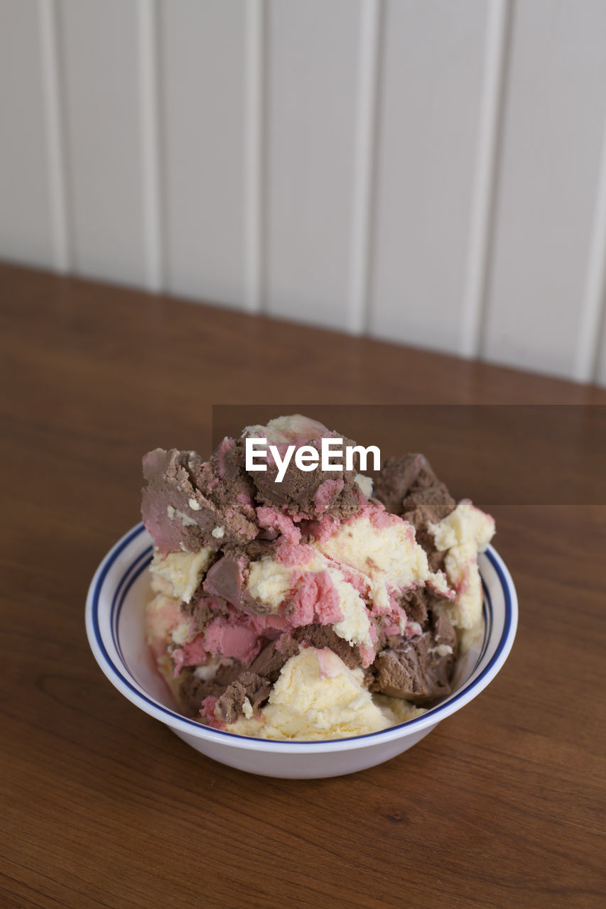 Large bowl of chocolate, vanilla and strawberry ice cream