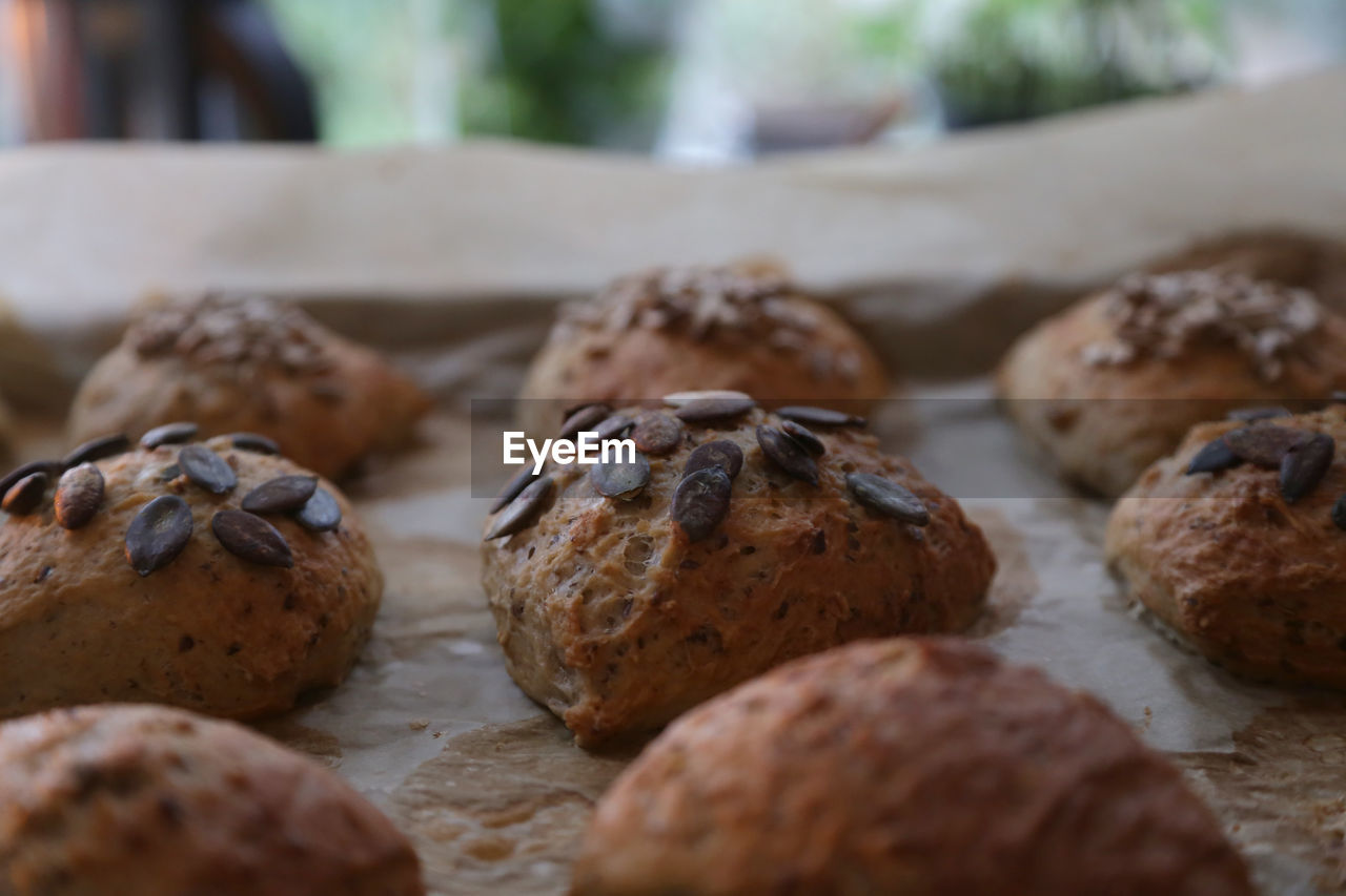 High angle view of buns on baking sheet