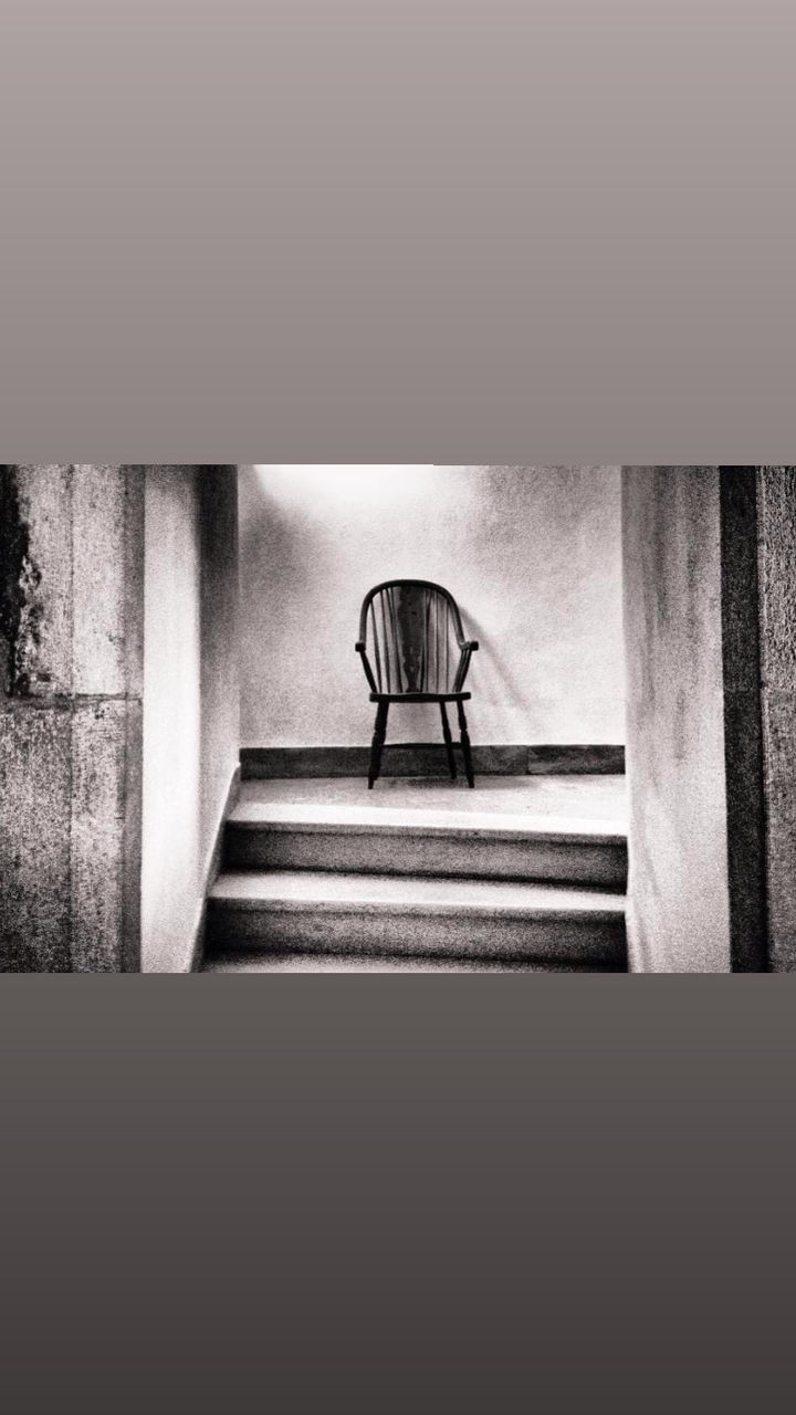 black and white, indoors, architecture, no people, staircase, monochrome photography, built structure, wall - building feature, monochrome, furniture, steps and staircases, chair, transfer print, black, auto post production filter, seat, white, absence, copy space, railing, day