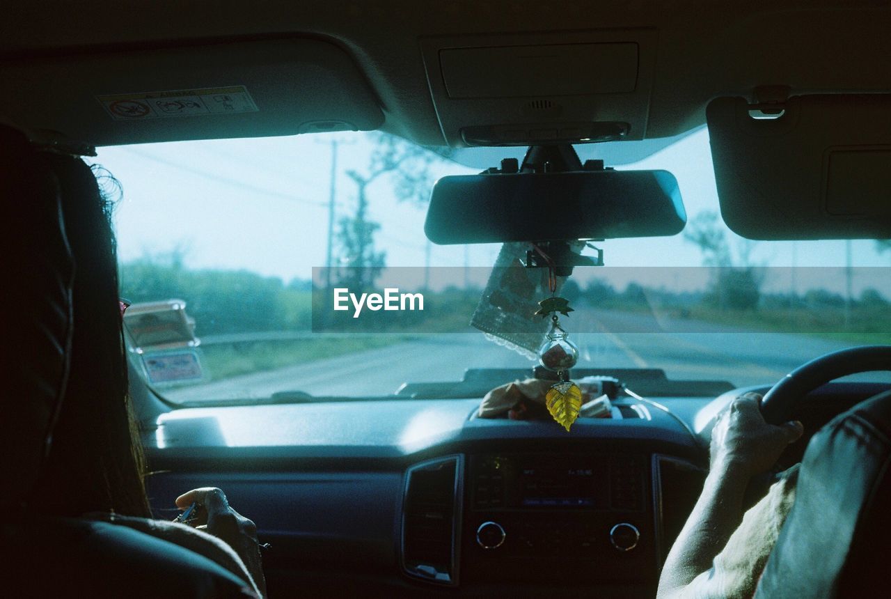 Road seen through car windshield