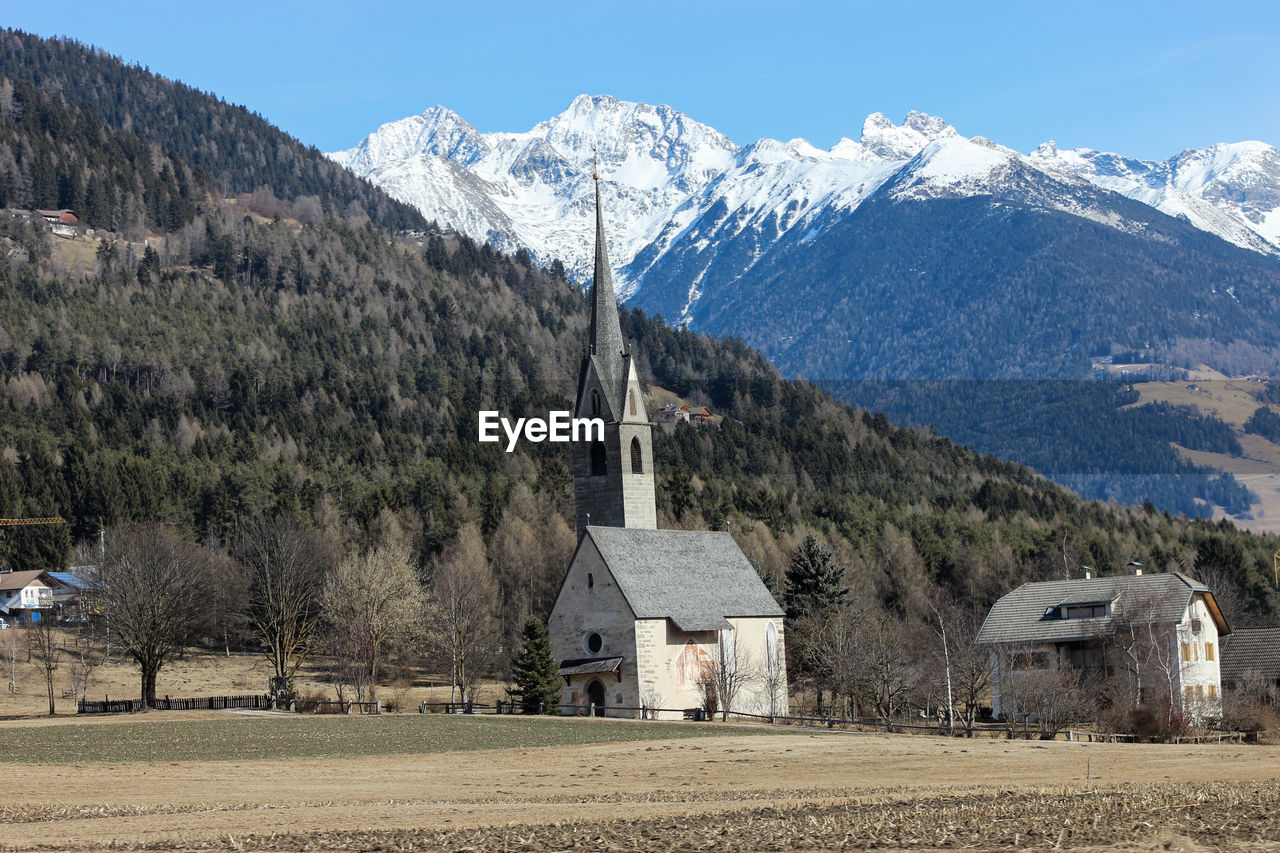 Scenic view of mountains against sky during winter