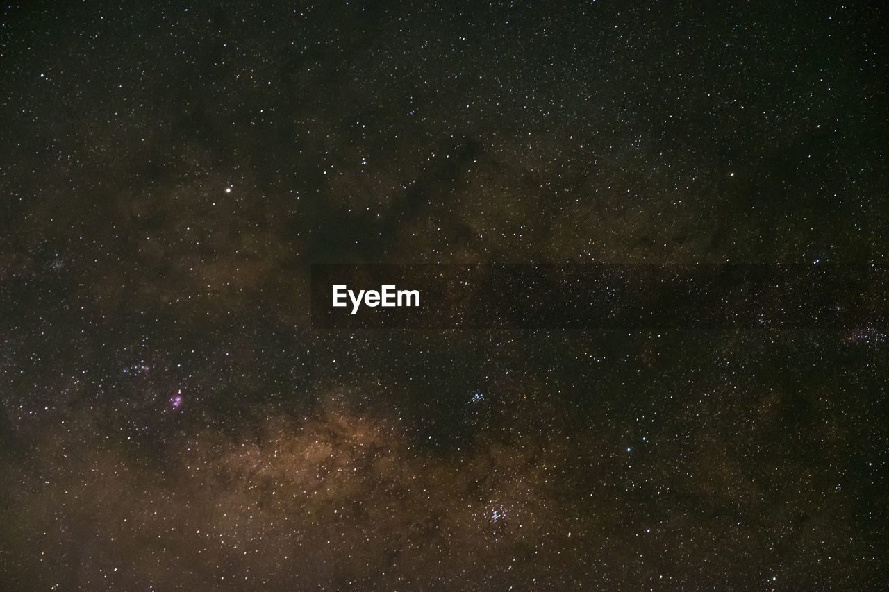 LOW ANGLE VIEW OF STARS AGAINST SKY