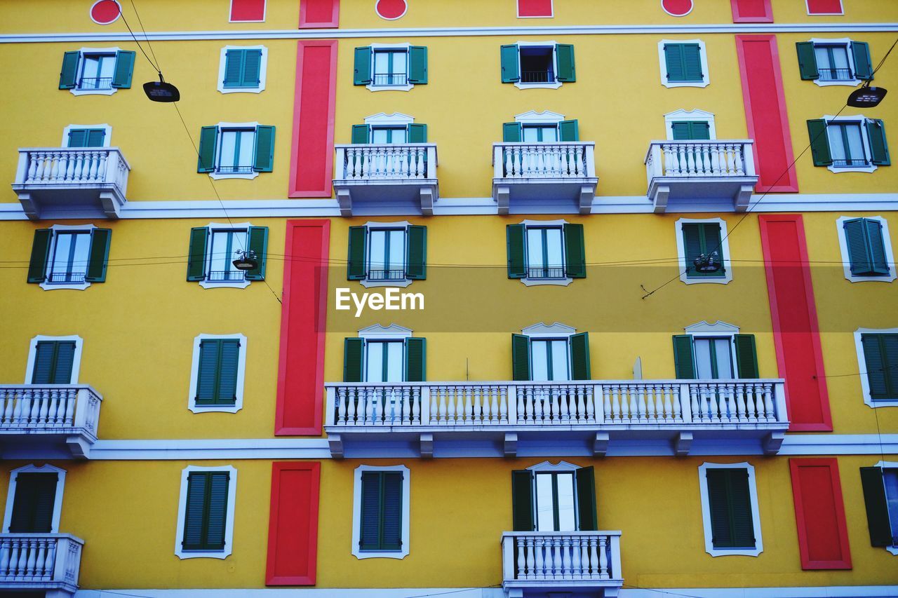 FULL FRAME SHOT OF YELLOW BUILDING