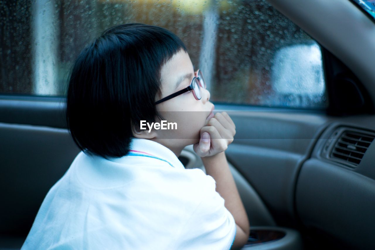 Girl sitting in car