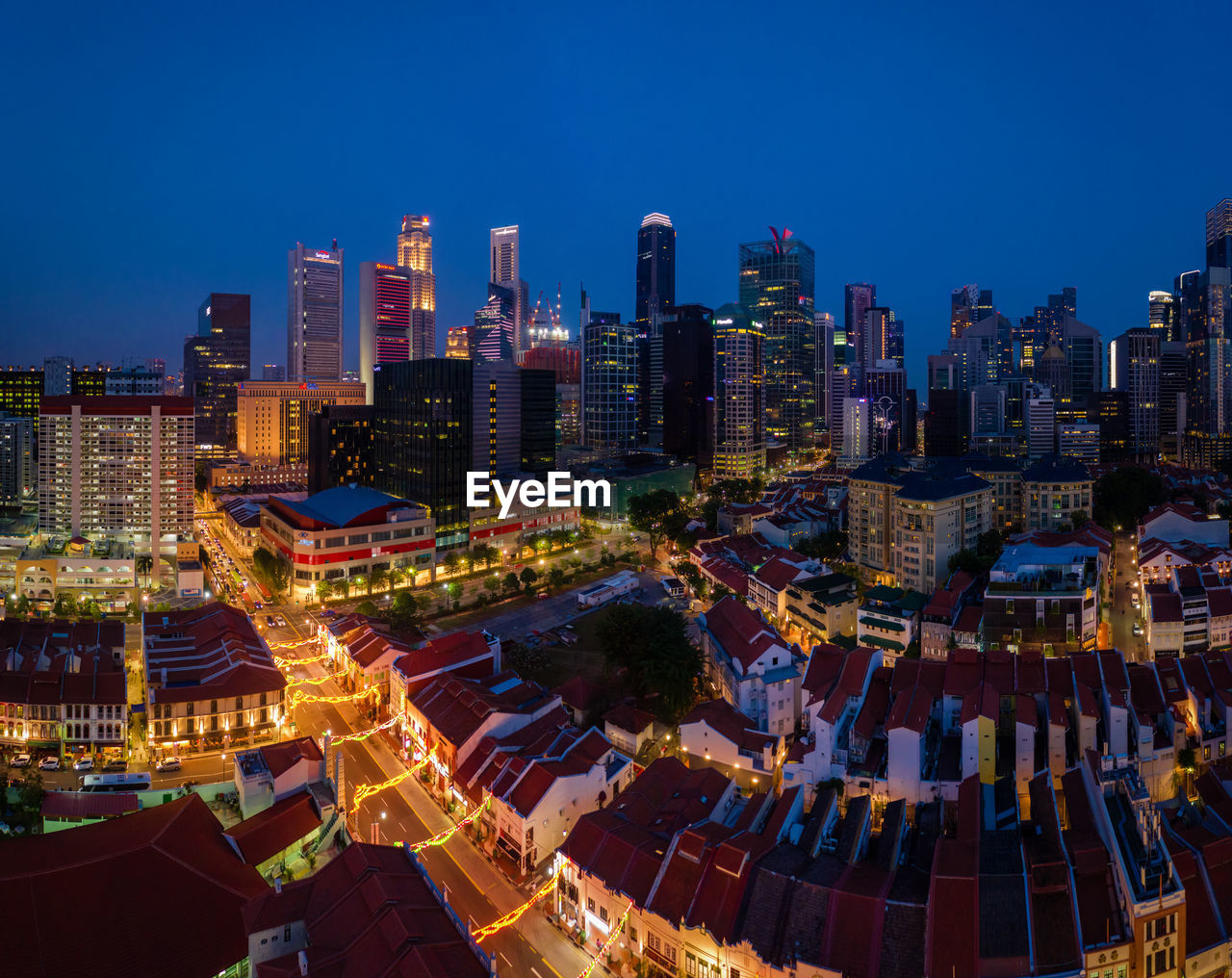 Aerial view of illuminated chinatown buildings in singapore city at night