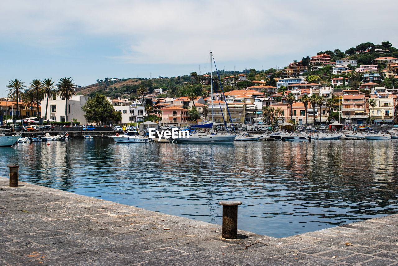 VIEW OF HOUSES AT WATERFRONT