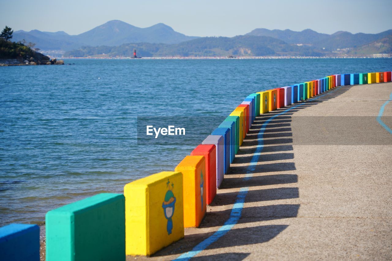 Scenic view of sea against mountain