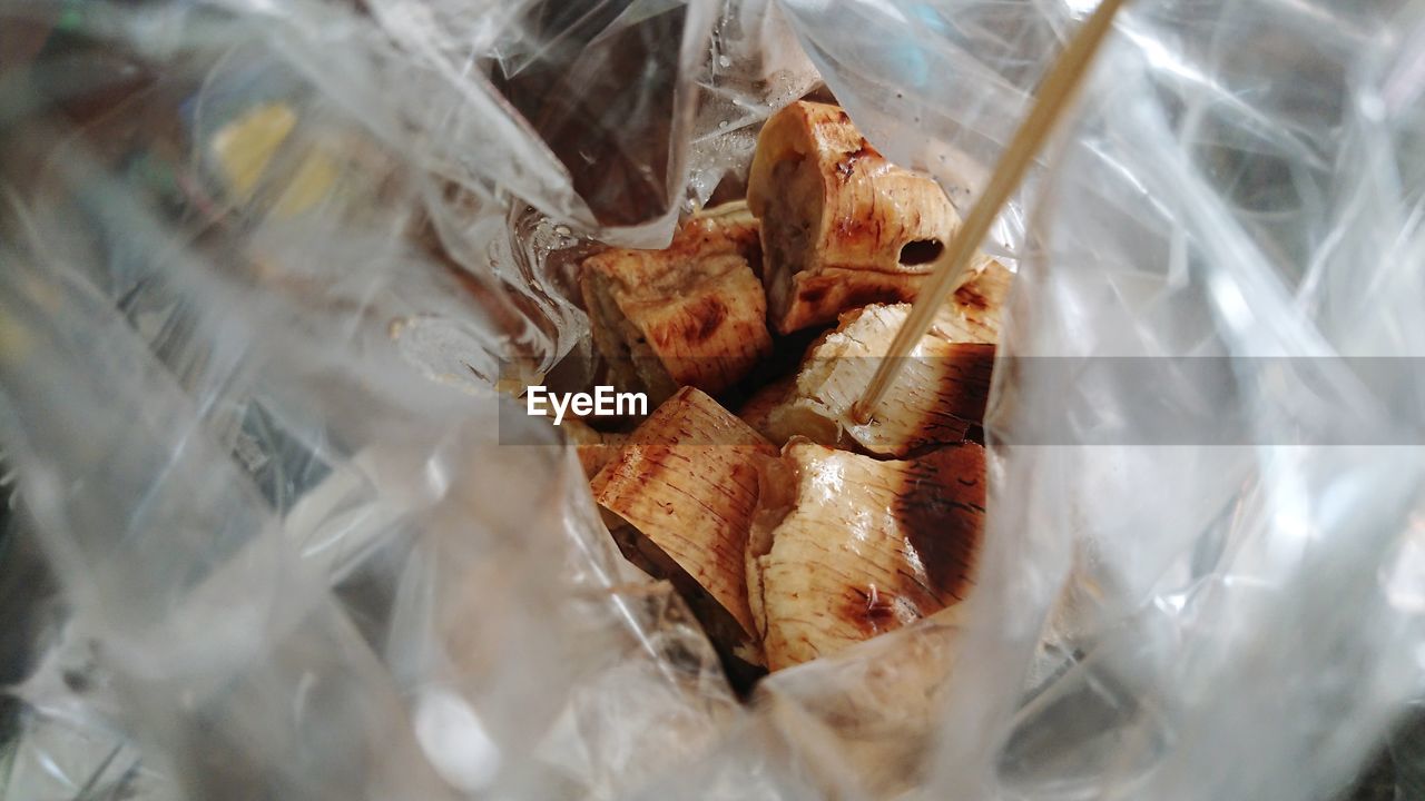 High angle view of cooked meat in plastic bag