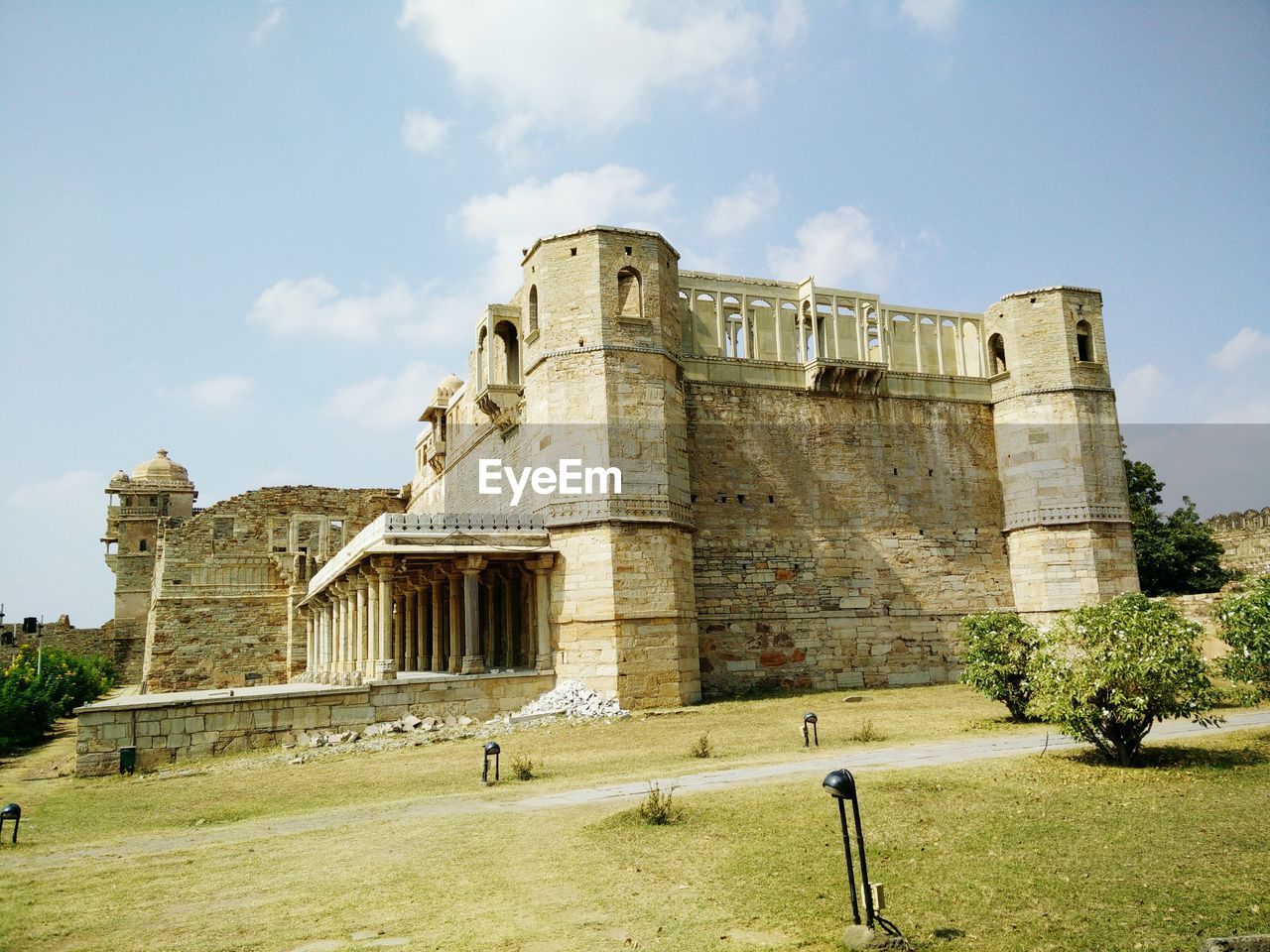 Low angle view of old fort against sky