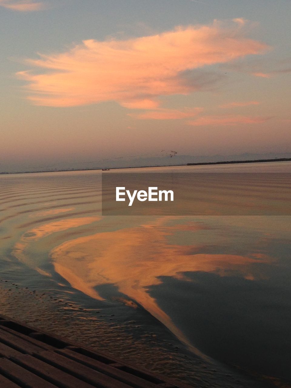 SCENIC VIEW OF SEA DURING SUNSET