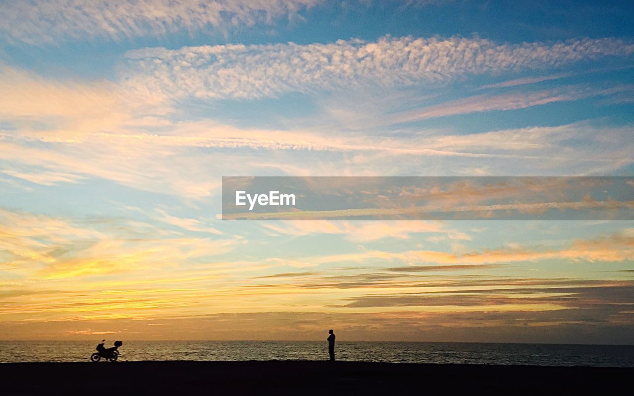 VIEW OF SEA AT SUNSET