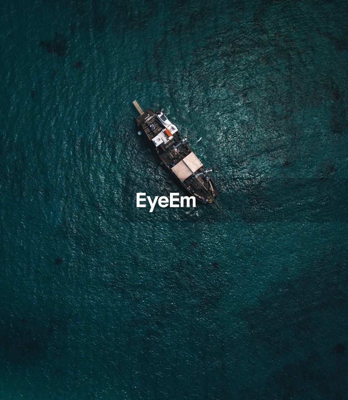 Aerial view of ship sailing in sea