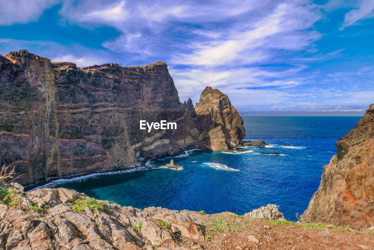 PANORAMIC VIEW OF SEA AND ROCKS